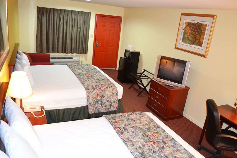 Executive Inn & Suites Magnolia Ngoại thất bức ảnh